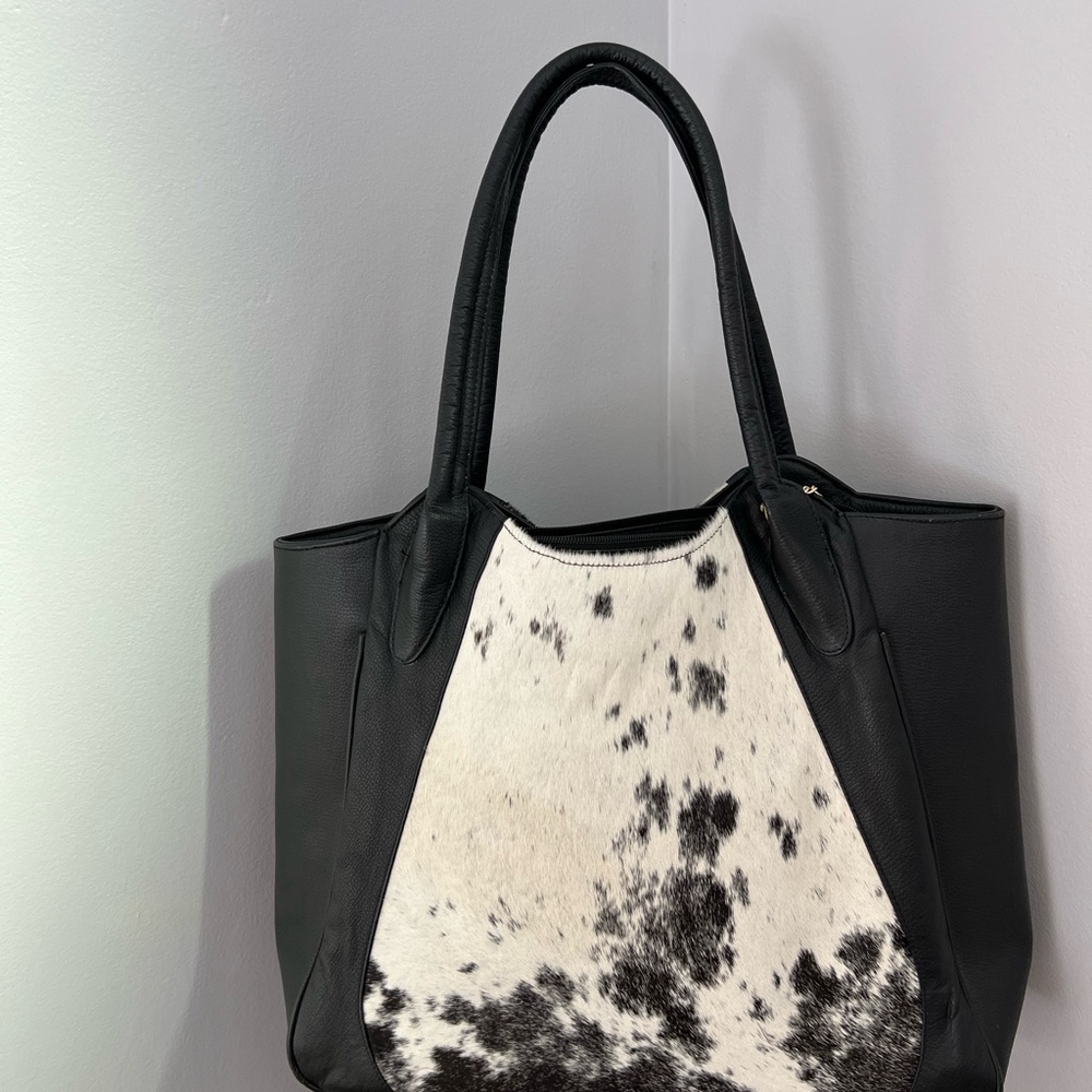 Handmade Cow Hide Leather shoulder bag.